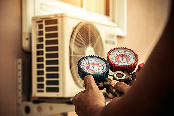 Professional Hvac technician working in Falls City, OR
